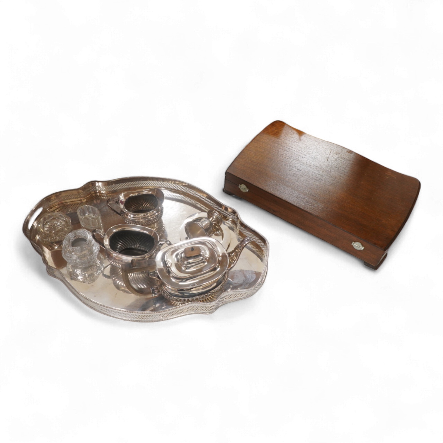 Webber & Hill, an oak cased canteen for six, a shaped galleried tea tray-60cm wide and tea service etc